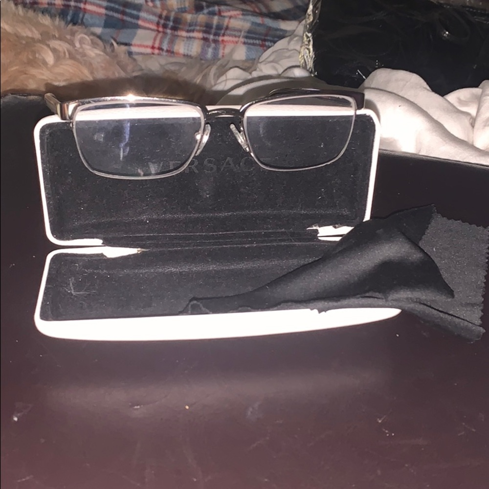 Clear colored Versace reading Glasses.